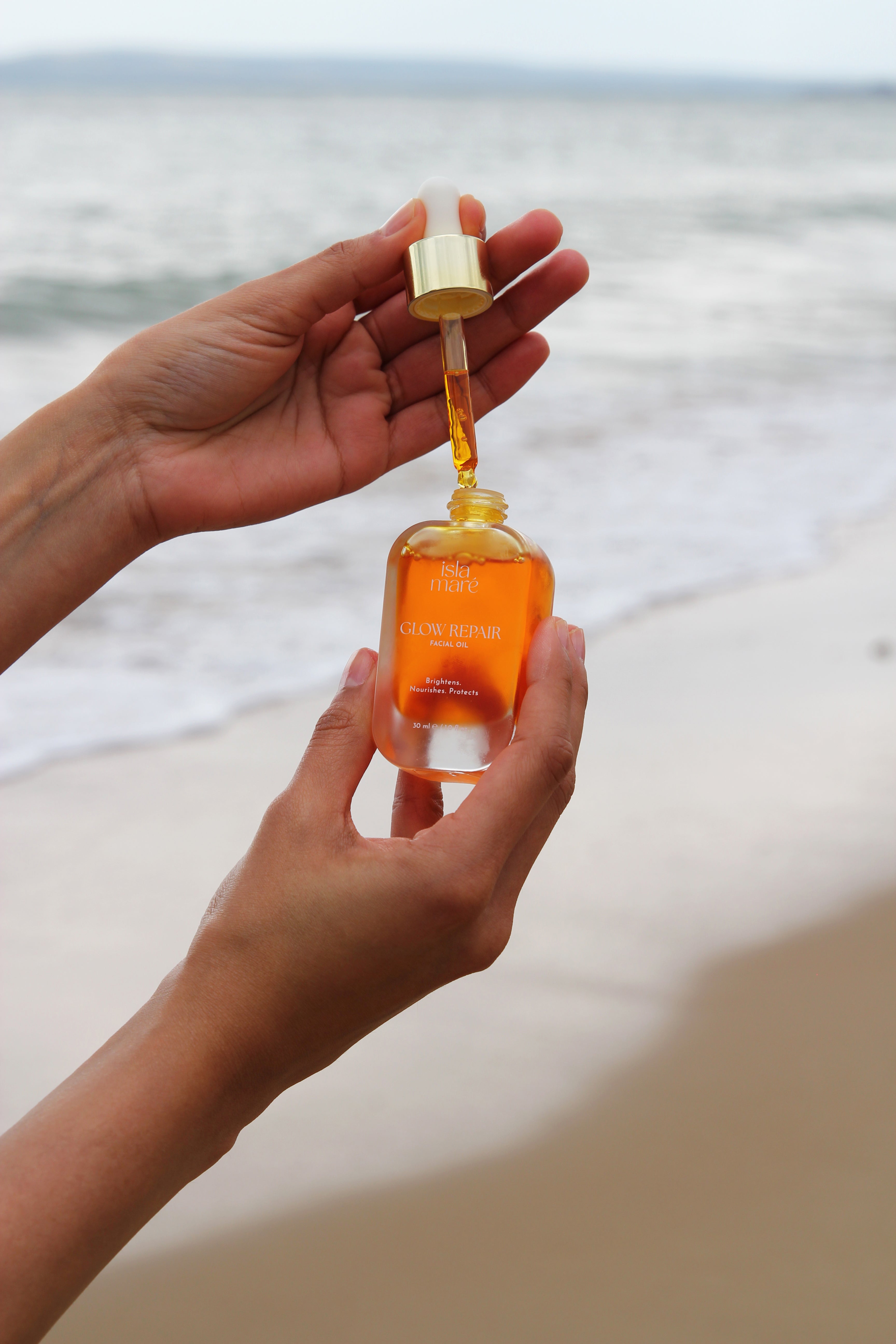 Luxury Glow Repair Facial Oil displayed on skincare vanity