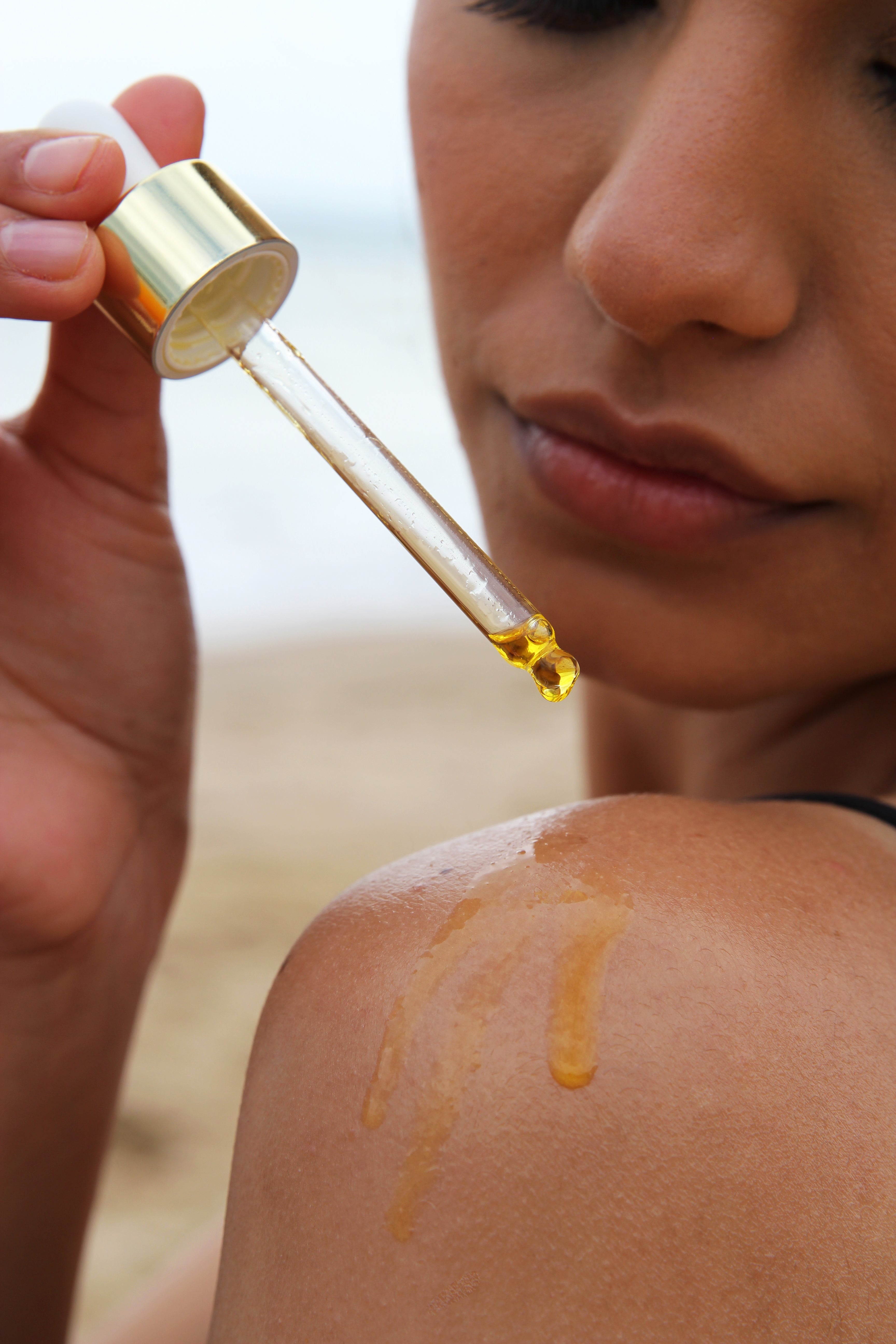 Luminous Touch Body Oil bottle for radiant and glowing skin